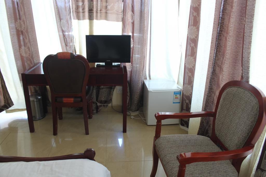 Mic Hotel Dar es Salaam Pokoj fotografie